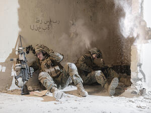 Soldiers under enemy fire (Shutterstock)