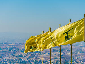 Hezbollah flags over southern Lebanese land (Shutterstock)