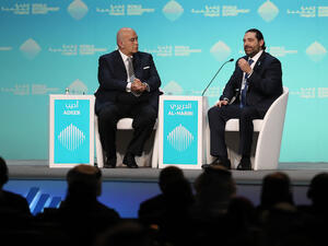 Lebanese Prime Misister Saad Hariri (R),speaks with journalist Emad el-Din Adeeb, during the opening session of the World Government Summit in Dubai, on February 10, 2019.  (AFP)