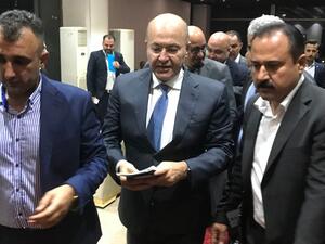 Iraq's newly elected president, Kurdish politician Barham Salih (C). (AFP/File)