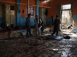  At least 20 people killed including two Afghan journalists after twin blasts at a Kabul wrestling club on September 5 that left another 70 wounded, officials said. (WAKIL KOHSAR / AFP) 