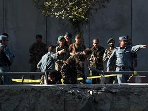 Afghan security personnel investigate the site of a twin suicide bombing near the Ministry of Defense in Kabul on September 5, 2016. The death toll from a Taliban double suicide bombing in the Afghan capital Kabul jumped to 24 with 91 wounded, the health ministry said. (AFP/Wakil Kohsar)