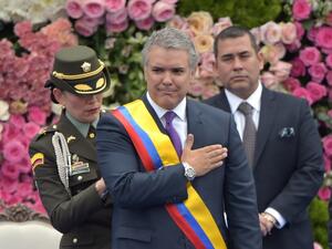 Colombia's new President Ivan Duque gestures after receiving the presidential sash during his inauguration ceremony at Bolivar Square in Bogota, on August 7, 2018. (Raul Arboleda / AFP)