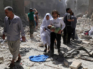 A woman and child were killed by rebel rocket fire in northern Aleppo, Sunday. (AFP/File)  