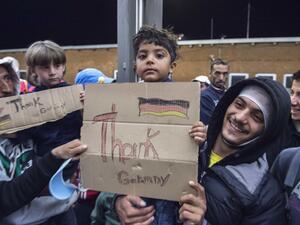 Refugees arrive at the train station in Germany. (AFP/File)