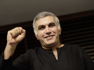 Bahraini human rights activist Nabeel Rajab gestures at his home in the village of Bani Jamrah. (AFP/File) 