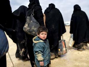 Syrian refugees on the Turkish border. (AFP/Bulent Kilic) 