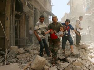 At least four children were killed when shells fired by militants hit a school in the government-held area of Aleppo.  (AFP/File) 