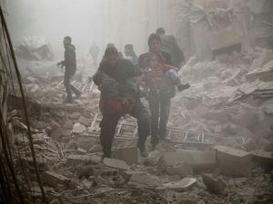 Victims are evacuated after an airstrike in the eastern Ghouta region near Damascus. (AFP/File)