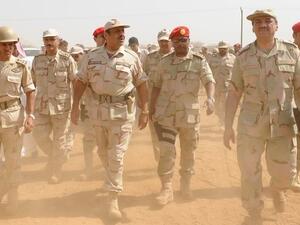 Saudi deputy Defence Minister Prince Khaled bin Sultan (3rd right) visits troops in the southwestern province of Jizan near the border with Yemen. (AFP/File) 