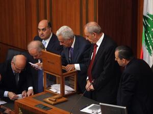 Lebanese members of parliament count the votes after casting their ballots to elect the new Lebanese president in the parliament building in downtown Beirut on April 23, 2014. (AFP/Joseph Eid) 