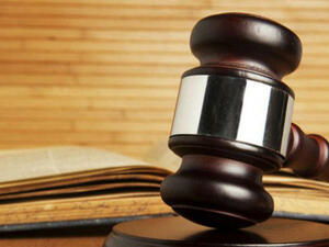 Two Nigerian men were sentenced to life on Wednesday after a federal high court found them guilty of masterminding the Oct. 1, 2010 bombing. (AFP/ File Photo)