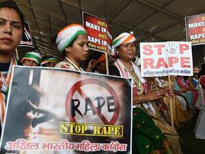 Indians hold placards in reaction to a rape case during a rally in New Delhi on April 29, 2018. (AFP/File Photo) 