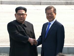 North Korea's leader Kim Jong-Un (L) and South Korea's President Moon Jae-in shaking hands at Inter-Korean Summit. (AFP/ File Photo)