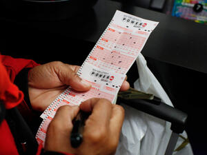 An Australian man is suing New South Wales Lotteries, saying a store clerk threw away his $3.3 million winning ticket more than a decade ago. (AFP/ File Photo)