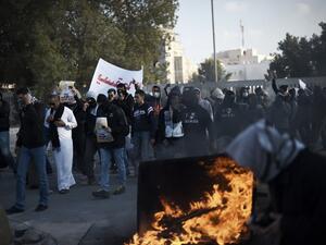 Bahraini protesters take part in a demonstration to mark the fifth anniversary of the Arab Spring-inspired uprising, on February 12, 2016, in the mainly Shiite village of Sitra, south of Manama. (AFP/Mohammed al-Shaikh)