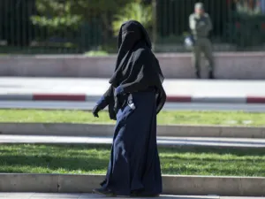 Government lawyers expect the law to prevail because it requires people to show their faces for identification purposes (AFP/File)
