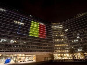 The Belgian flag is projected on the EU Commission building in tribute to the victims of Brussels following triple bomb attacks in the Belgian capital that killed about 35 people and left more than 200 people wounded. (AFP/Philippe Huguen) 