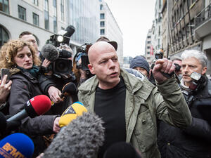 Sven Mary, Belgian lawyer of Paris attacks suspect Salah Abdeslam, talks to the media outside the building of the Federal Police in Brussels, on Saturday. (AFP/Belga/Aurore Belot)