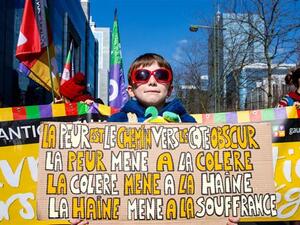 People take part in a national protest against racism, hatred, discrimination, inequality and aggression in Brussels, March 24, 2018. (AFP/ File Photo). 