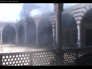 Khalid ibn al-Waleed mosque in Homs torched. (YouTube screen grab)