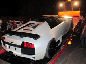 A Kuwaiti Lamborghini getting towed and many are happy