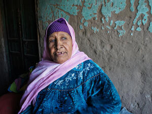 This old woman is the leader in the community and still holds hope to return to Palestine. (image from Egyptian Chronicles)
