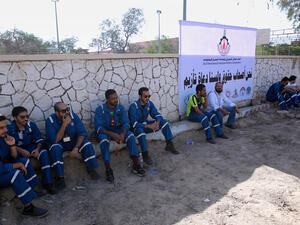 Kuwaiti oil workers at the union headquarters in Al-Ahmadi, 35 km south of Kuwait city.  (AFP/File)