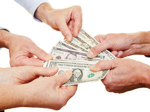 "Only lend up to the amount of money you’d feel comfortable placing on the table in a game of roulette or craps." (Shutterstock)