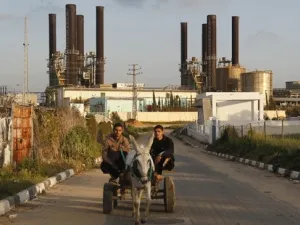 Gaza Strip residents have no electricity for 16 hours a day due to limited fuel and capacity. (AFP/Mohamed Abed)