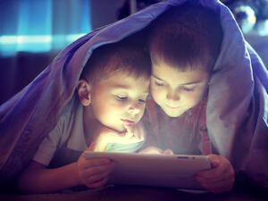 Too much time using digital media in the wrong way is linked to children's quality of sleep, child development and physical health. (Shutterstock)