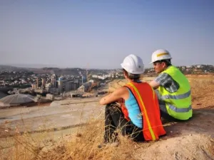 Lafarge Holcim workers overlooking their cement plant in Jordan. (Lafarge Holcim)