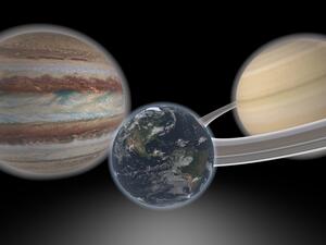 This artist's concept shows a hypothetical Earth-like planet and two giant 'neighbors'. (Credit: NASA/JPL-Caltech)