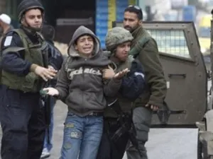 A rights group says more than 300 Palestinian children are currently in prison in Israel and exposed to ill treatment. (AFP)