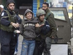 A rights group says more than 300 Palestinian children are currently in prison in Israel and exposed to ill treatment. (AFP)