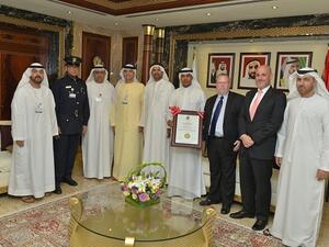 Ahmed Mahboob Musabih receiving the certificate