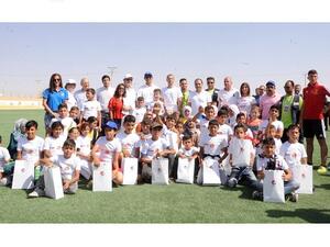 Prince Ali Bin Al Hussein surrounded by more than 200 girls and boys living in the camp during the opening ceremony on Tuesday September 12, 2017. 