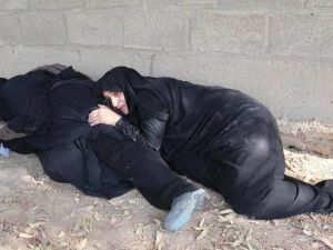 A female Iranian photojournalist taking pictures during a deadly attack on a military parade in southwestern Iranian city (Mehr News Agency/Twitter)