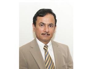 Dr. Abdullatif Al Khal , HMC's Deputy Chief Medical Officer and Head of Infectious Diseases.