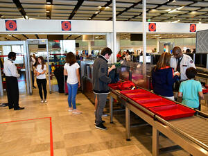 Passengers flying from several Middle Eastern countries will no longer be allowed to bring electronics larger than 16 cm in length on board with them. (Shutterstock)