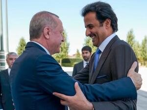 اردوغان مستقبلا تميم خلال زيارته لتركيا