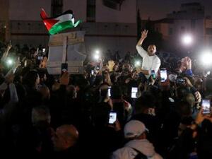 محتجون خلال مظاهرة في عمان

