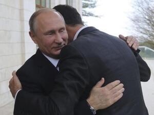 بوتين محتضنا الاسد