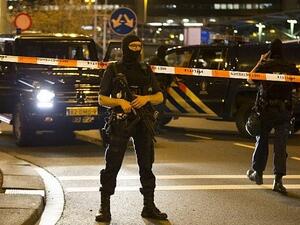 Dutch policemen stand guard by a cordoned off area outside Amsterdam's Schiphol Airport. (AFP/ File)