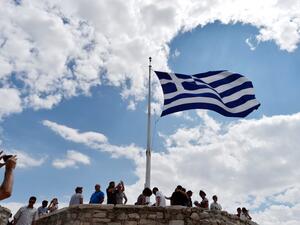 Greek flag atop the Acropolis archaeological site. (AFP/ File Photo)