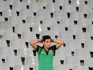 An Ahly supporter reacts following the CAF Champions League group A stage football match between Egypt's Al-Ahly and Morocco's Wydad Casablanca at the Borg el-Arab Stadium in Alexandria. (AFP/File)