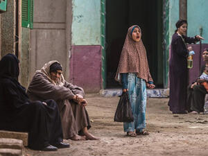 An Egyptian girl pauses in an alley in the village of al-Jendyaa, in the Bani Mazar province, in the Minya governorate south of Cairo. (AFP/File)