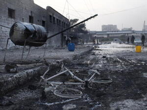 An air strike by pro-government forces on the Syrian city of Aleppo on November 28, 2013. [Mohammad Al-Khattib/AFP]