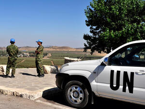 UN soldiers examine the Israeli-Syrian border on August (Shutterstock/ChameleonsEye)
