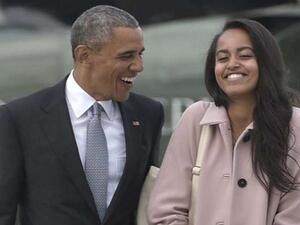 الرئيس الأمريكي السابق باراك أوباما وابنته ماليا